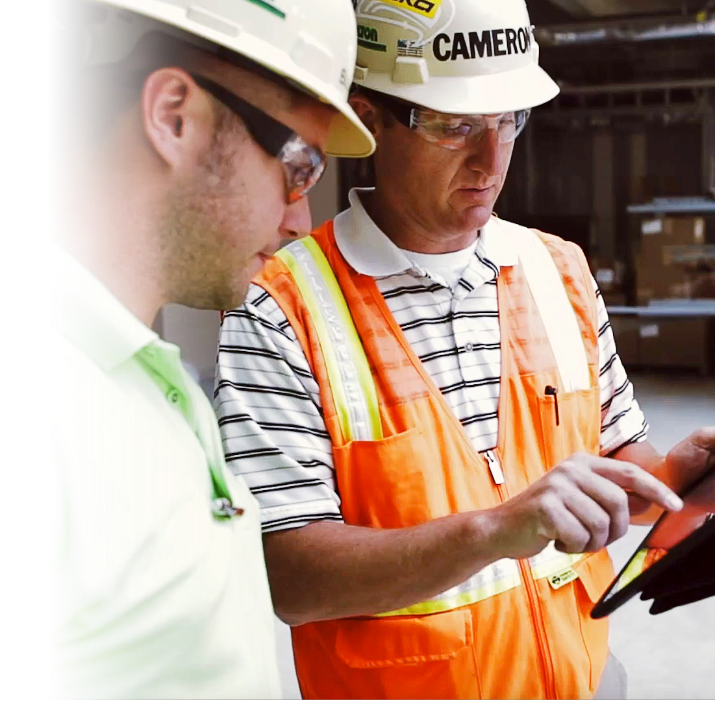 Construction Workers Creating Daily Logs 